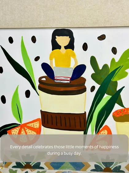 Every detail celebrates the little moments of happiness during a busy day, like this character working on her laptop while sitting on a giant coffee cup.