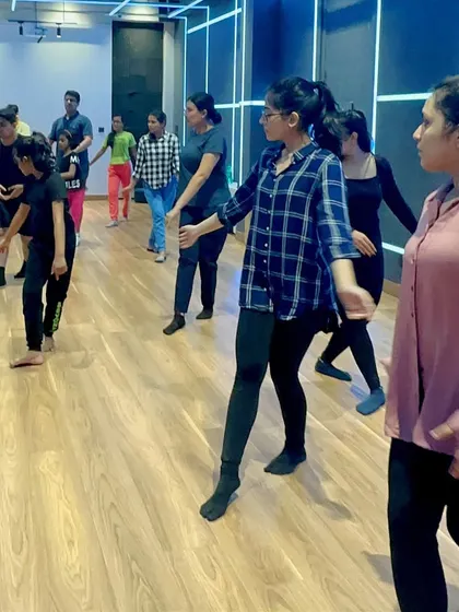 Photos from a contemporary and jazz workshop, showing a diverse group of students learning together. My classes are a great way to meet people and be part of a community.