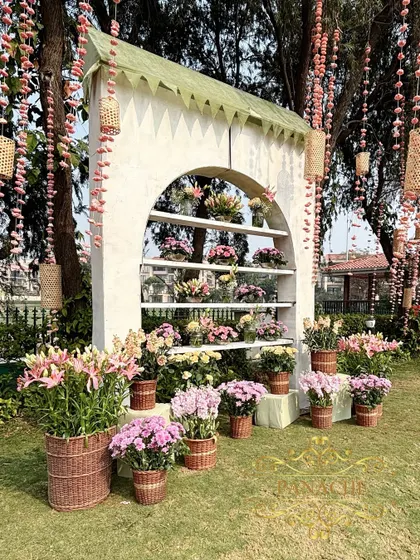 A unique and beautiful photo booth designed to look like a bouquet shop, filled with fresh flowers in pastel shades.