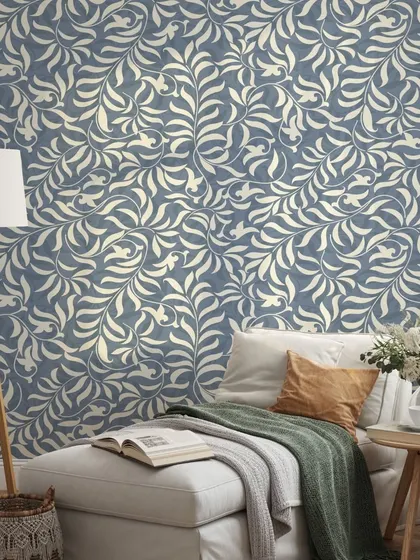 This cozy reading nook is enhanced by our Floral Sway wallpaper in a calming blue. The gentle, flowing pattern creates a peaceful environment perfect for relaxation.