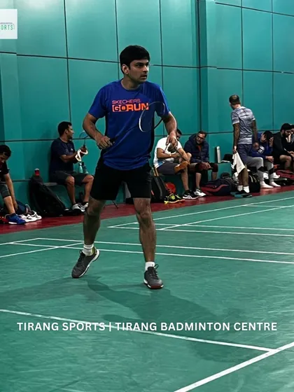 A player mid-rally during the Tirang Sports Amateur Badminton Tournament. Our events are a great platform for players of all levels to test their skills.