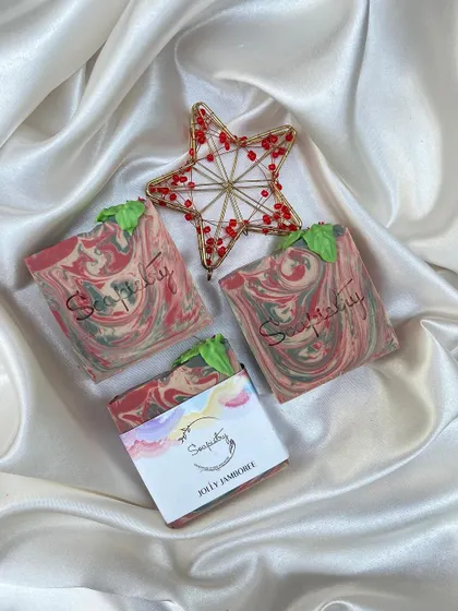 The Jolly Jamboree soap, a cheerful mix of Christmas colors.