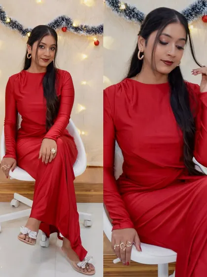 A seated pose from the Christmas shoot, showing the details of the makeup and the festive background.
