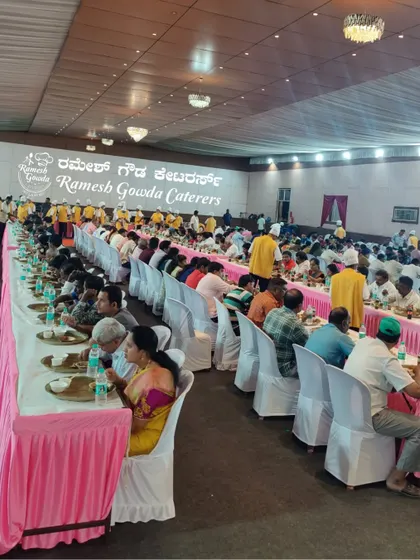 A consistent view of our large-scale service. The long tables and numerous guests are a testament to our capacity.