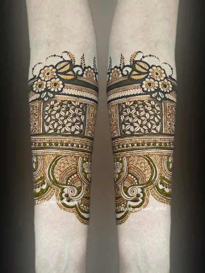 The clean and repeating patterns on the forearm create a beautiful cuff. This part of the design is just as important as the hands.