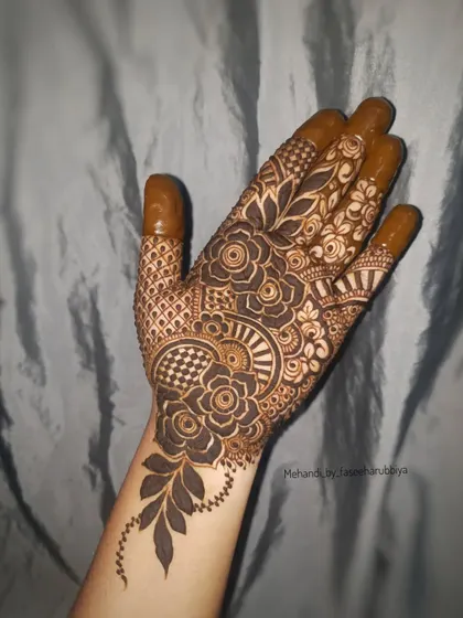The completed design with full finger work, showing the intricate details.