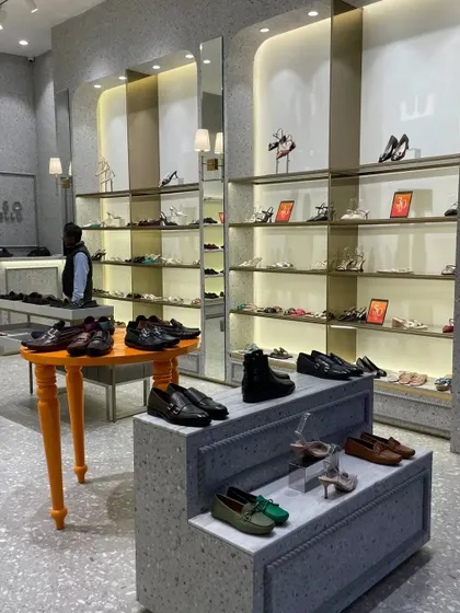A central display island featuring new arrivals and featured products, creating a focal point in the store.