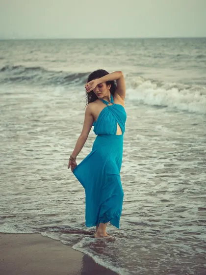 Capturing a pensive, story-driven moment with Ridhima. The soft, overcast light on the beach created a beautiful, moody atmosphere.