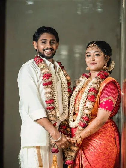 A classic couple portrait. The groom's makeup and hair are done to look great in professional photos, without looking heavy or unnatural in person.