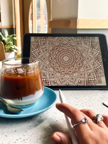 Solo art dates are my favorite. Spending time in a cafe with my iced coffee and my tablet, sketching out new digital designs for upcoming projects.