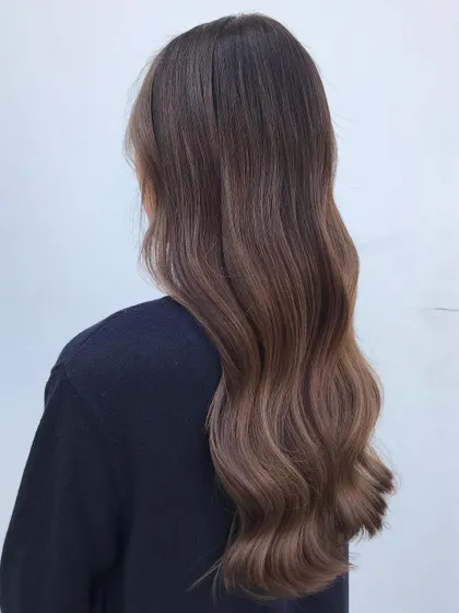 A beautiful signature balayage with soft, natural tones. This French balayage technique creates an effortlessly chic and timeless look.