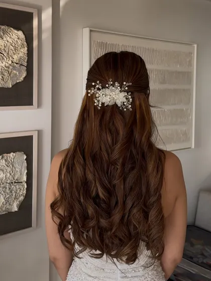 The same elegant hairstyle from a slightly different angle, showing how the accessory sits perfectly at the crown.