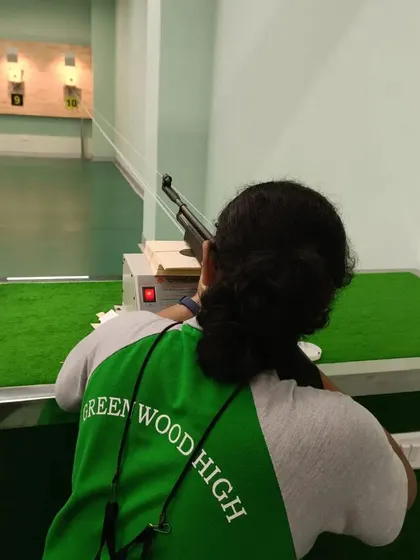 A student from our school partnership program at the shooting lane. We are proud to help nurture the next generation of Indian athletes.