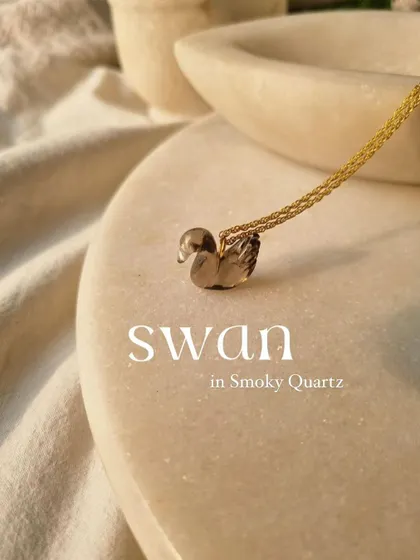 My Smoky Quartz swan pendant, a piece designed to bring emotional balance and disperse fear.