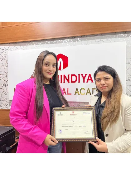 A bright future ahead. Handing over this certificate is a promise of a new beginning for another talented student.