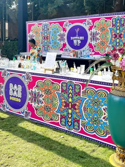 Another view of the fun and festive carnival bar, ready to serve drinks to happy guests.