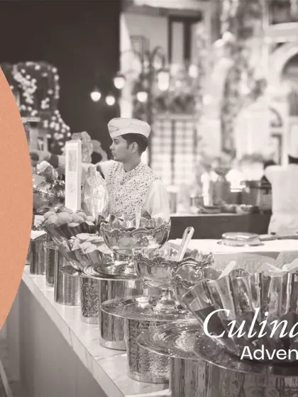 Elevate your dining experience with our culinary adventure. This chaat counter, with its gleaming silver bowls and organized setup, is a testament to our commitment to quality and presentation.