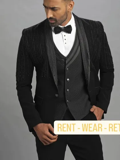 Our black embroidery designer suit is the definition of modern groom style. It’s a powerful look that combines classic tailoring with contemporary details, making your engagement or reception unforgettable.