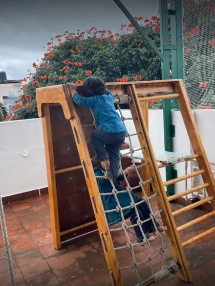 Our wooden play gym is a favorite among the little ones. It offers multiple ways to climb and explore, encouraging imaginative play and physical development.