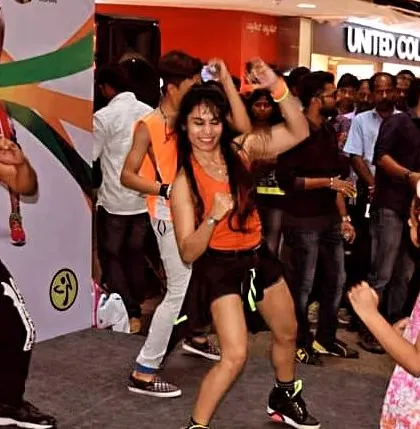 A duplicate of 39, capturing the pure joy and energy of a live Zumba performance.