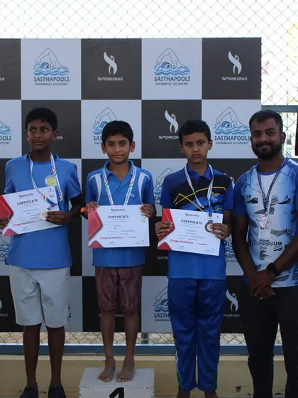 Another set of champions from our anniversary swimming cup, celebrating their hard-earned victory.
