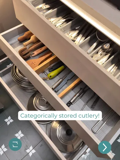 An AIA Kitchen features categorically stored cutlery, with each type of spoon, fork, and knife in its own compartment.