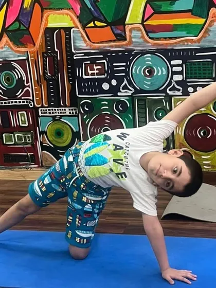 Another one of our students from the summer camp, confidently holding a modified side plank. It's amazing to see their progress and growing love for yoga.