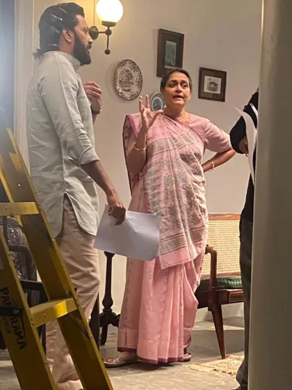 A candid moment on the set of 'Raid 2' with Riteish Deshmukh and Supriya Pathak ji. Discussing the scene and the look is a collaborative process that helps bring the characters to life.