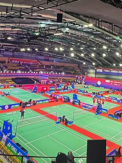 A wide view of the venue for the Yonex-Sunrise BWF World Junior Badminton Championships. For our 10th year of partnership, we managed the entire event, from court setup to fan engagement zones.
