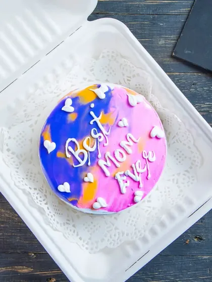 Our "Best Mom Ever" Bento Cheesecake, a special creation for Mother's Day. This vanilla cream cheese cheesecake comes in a cute bento box, making it a perfect, personal gift.