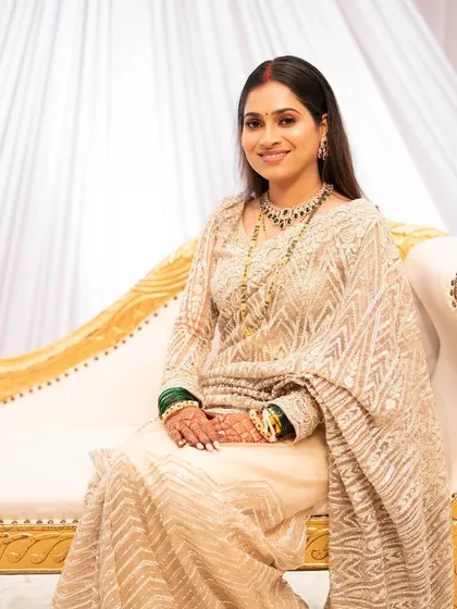 Grace in every drape. This bride wanted a soft, traditional look for her reception. I created a luminous base with subtle definition on the eyes to match her elegant off-white saree.