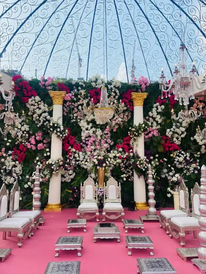 A closer look at the floral wall behind the mandap seating. I used a mix of roses, hydrangeas, and other blooms in varying shades of pink and white against a green backdrop to create a rich, textured, and romantic tapestry.