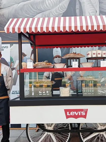 A custom-branded food cart created for an event with Levi's. This showcases our ability to create unique, themed catering solutions, including fun and casual food stations that enhance the event atmosphere.