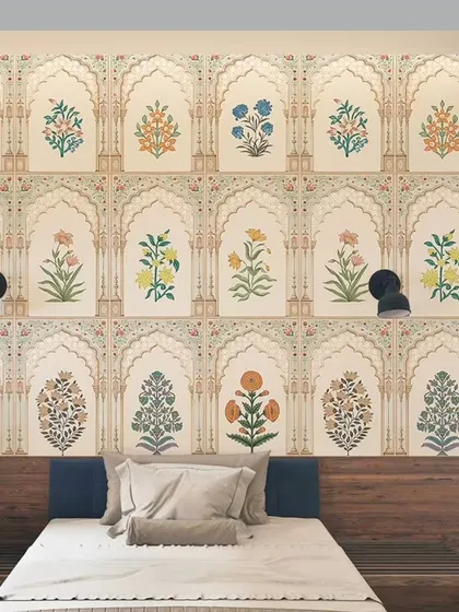 This wallpaper, installed in Hiranandani, Powai, features Mughal-inspired floral motifs set within arched panels. It creates a sophisticated and classic look for a bedroom wall.