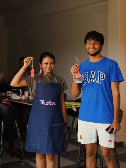 A happy participant and me after a successful macrame workshop. I love seeing people proud of what they've learned.