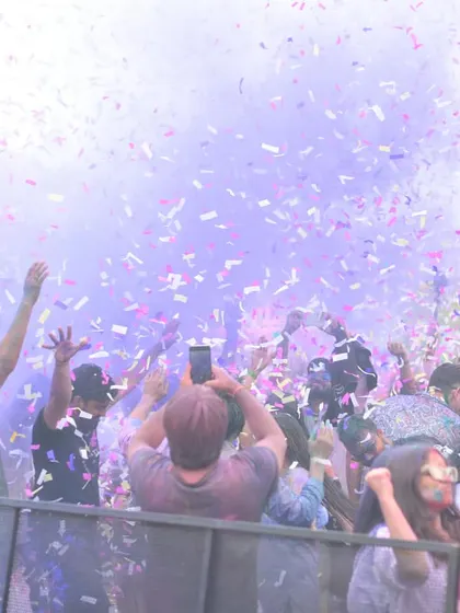 Confetti and colors filling the air at Sunburn. A festival is a multi-sensory experience, and my music is the driving force behind it all.