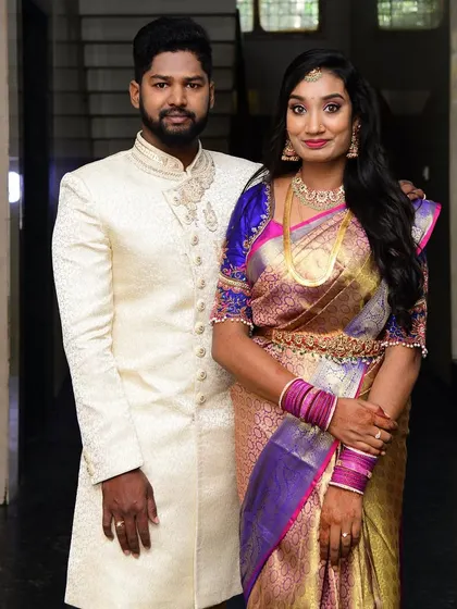 A lovely couple on their special day. The bride is wearing a simple and elegant necklace from my collection that perfectly complements her reception look.