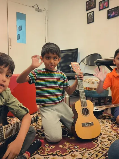 The next generation of rockstars. Kids at our summer camp get to try out electric guitars, ukuleles, and more.