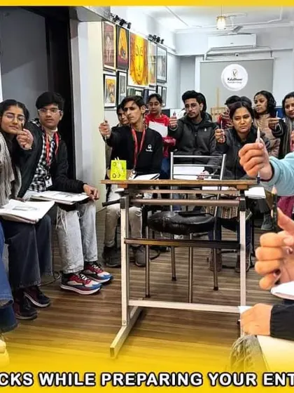 Our instructor giving tips and tricks to students preparing for their BFA entrance exams, focusing on techniques to improve speed and accuracy.