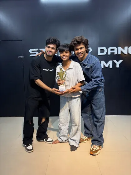 Celebrating a big win with one of our dedicated students. His performance was a highlight of the competition.