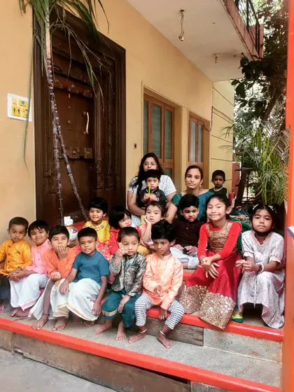 A group photo from our Pongal celebration. We embrace cultural traditions, and celebrating festivals like this is an important part of our curriculum.