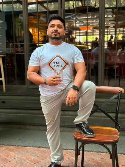 Posing outside a cafe. We love exploring our city and being part of the vibrant local community.