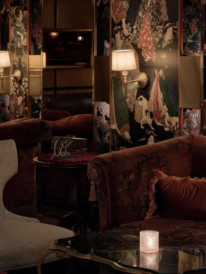 In the award winning ZLB23 speakeasy, we created intimate seating nooks that draw guests into the story. The design layers rich textures, from velvet sofas to a custom Japanese graphic wallpaper, to build a sophisticated and mysterious atmosphere perfect for a hidden jazz and cocktail bar.