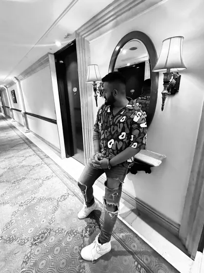 A quiet moment in the hotel corridor before the wedding madness begins. It's all about preparation and focus.