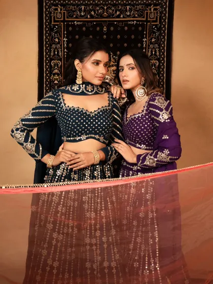 A beautifully composed shot of two models for a brand campaign. The image highlights the intricate blouse designs and the models' chemistry, creating an aspirational look.