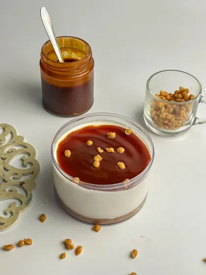 A delicious caramel cheesecake tub, topped with crunchy butterscotch bits for added texture. This is a sweet and salty combination that is incredibly satisfying.