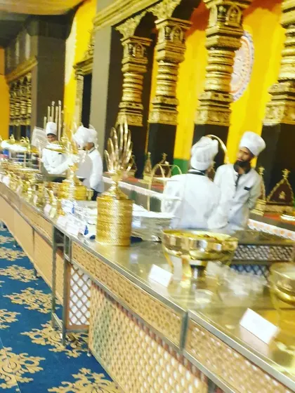A closer look at our staff managing the buffet. Their experience ensures that service is quick, polite, and efficient, even during the busiest moments of an event.