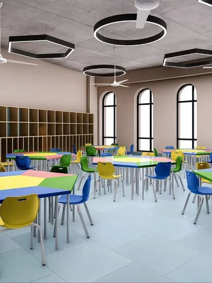 A render of a classroom with colourful, modular hexagonal tables. This flexible furniture arrangement is designed to support various learning styles, from individual work to collaborative group activities, fostering interaction and creativity.