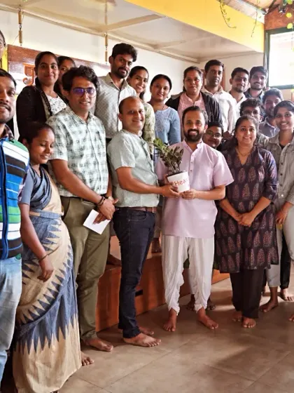 A group photo with the team at Health Heal after a session on the "Essence of Yoga in Daily Life." It's rewarding to see teams embrace wellness together.