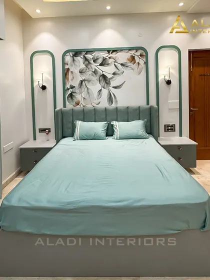 A frontal view of the serene, nature-inspired bedroom. The custom headboard with its floral art and arched frame creates a beautiful and balanced composition.